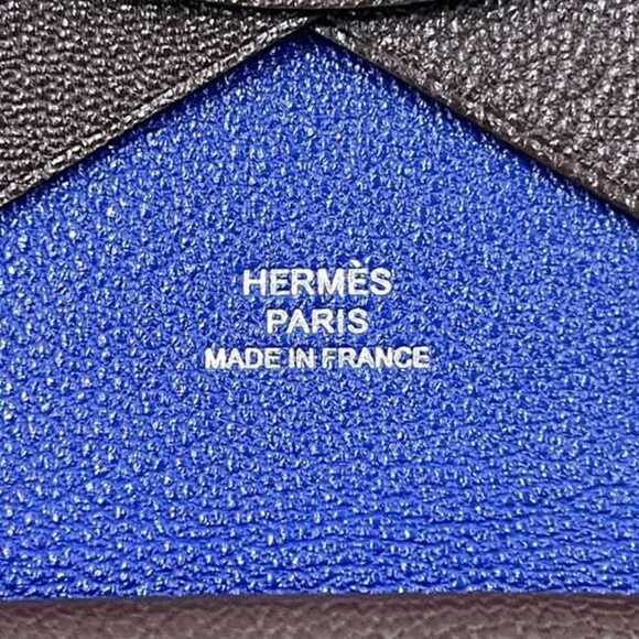 Hermes Hermès Calvi Duo bifold wallet (f-24736) in brown and blue with a leat...